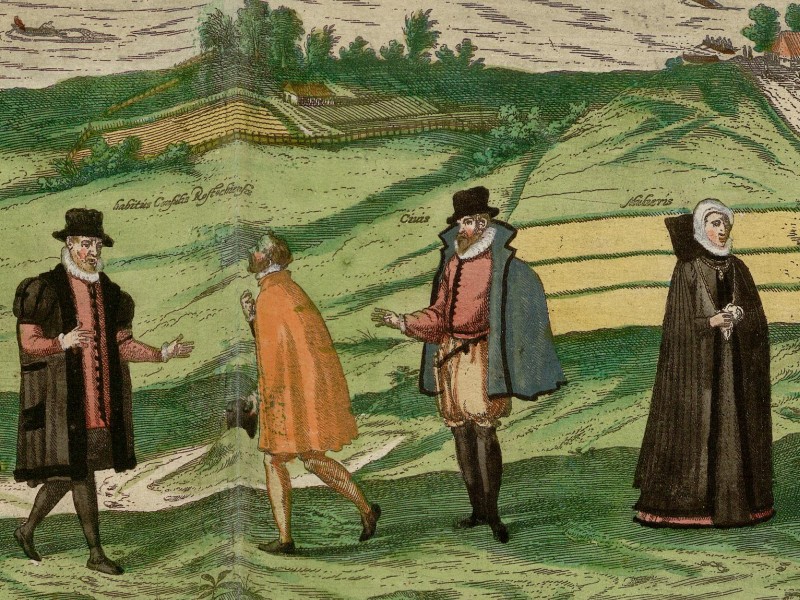 Three men and one woman dressed in local fashion in the foreground of a view of Rostock.