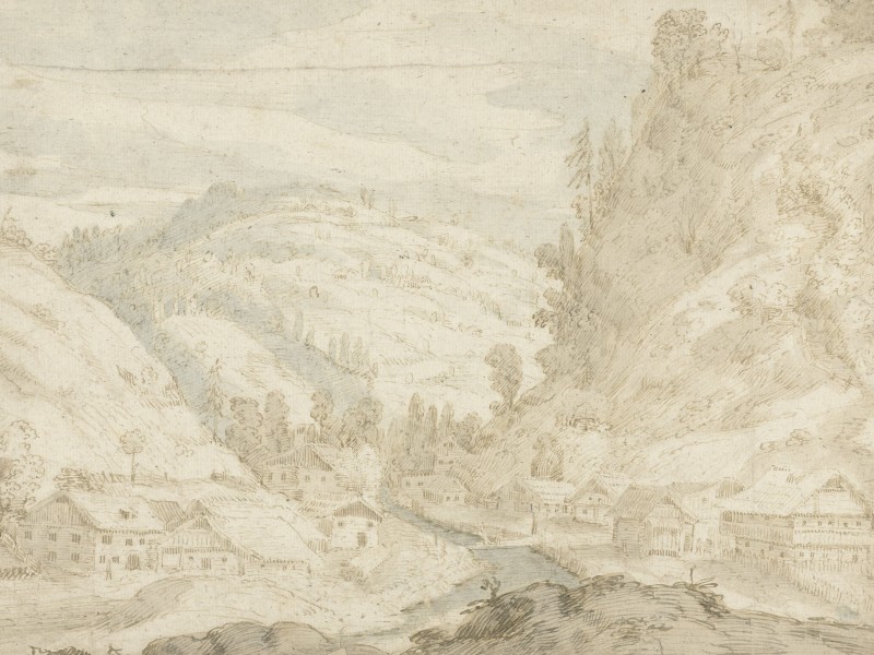 A village nestled between high mountains.