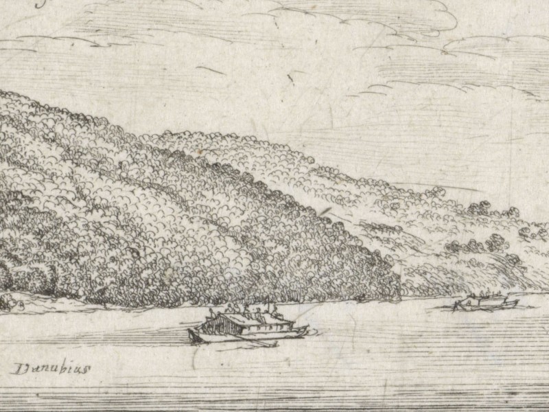 Two large boats travel down the Danube