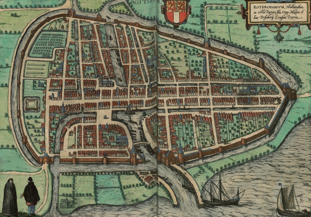 A bird’s-eye view of Rotterdam displaying a large city with a bustling harbour.