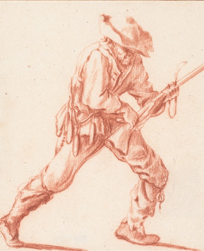 Drawing of a man loading a rifle.