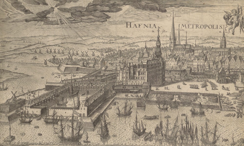 View of Copenhagen with the harbour and many ships in the foreground, and the fortified city with the palace and many churches in the background.